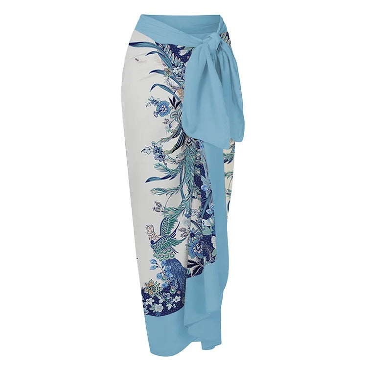 swimgirls Blauer, wendbarer Badeanzug mit Schleife und Schulterschnürung und Sarong/Rock 