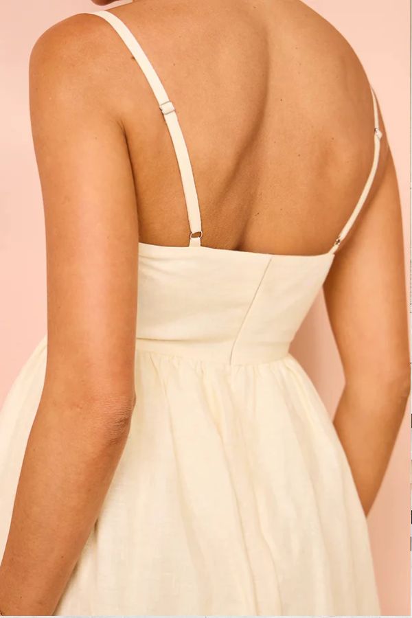 Robe longue ample à bretelles et poches, imprimé unique en mélange de lin et de fleurs paradisiaques