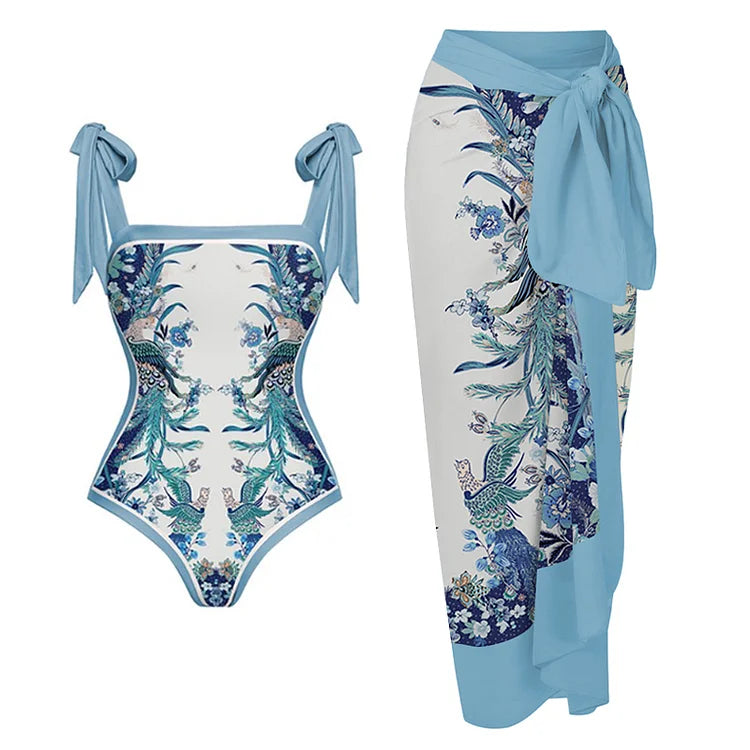 swimgirls Blauer, wendbarer Badeanzug mit Schleife und Schulterschnürung und Sarong/Rock 