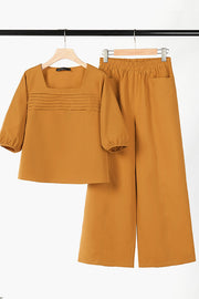 Loose solid color long sleeved top wide leg pants set