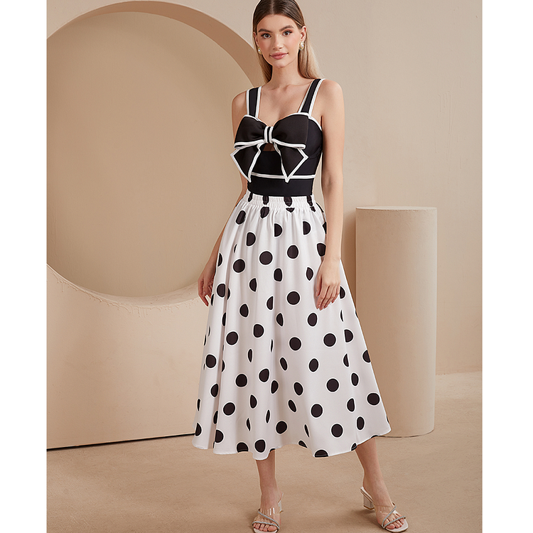 Maillot de bain une pièce et jupe à décor de nœud papillon noir et blanc 