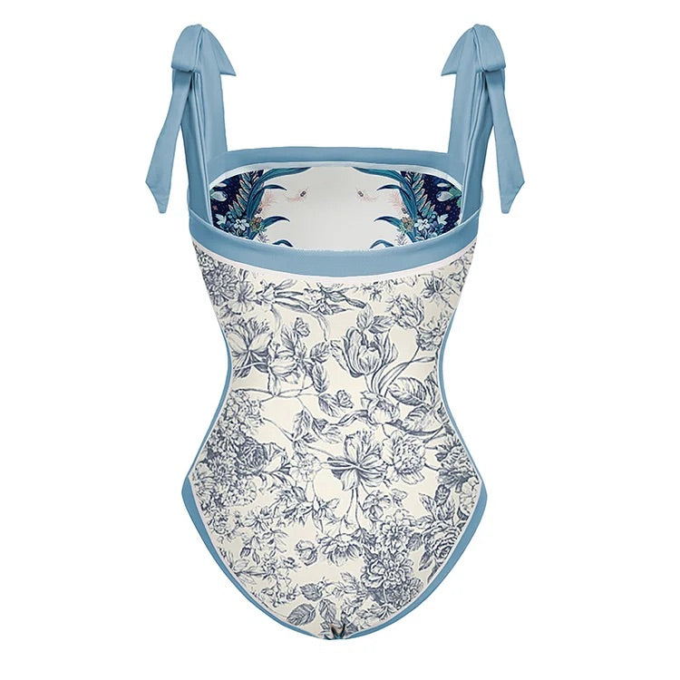 swimgirls Blauer, wendbarer Badeanzug mit Schleife und Schulterschnürung und Sarong/Rock 