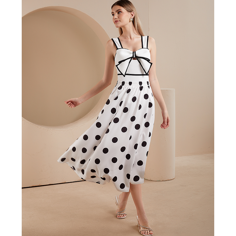 Maillot de bain une pièce et jupe à décor de nœud papillon noir et blanc 