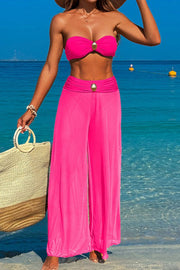 Three-piece swimsuit with button-like decorations on the chest