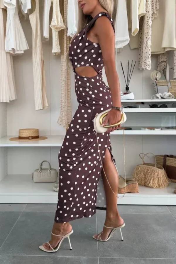 Roxane Stretch-Maxikleid mit gepunktetem Muster, Schulterpolstern, Metallausschnitten an der Taille und Schlitz