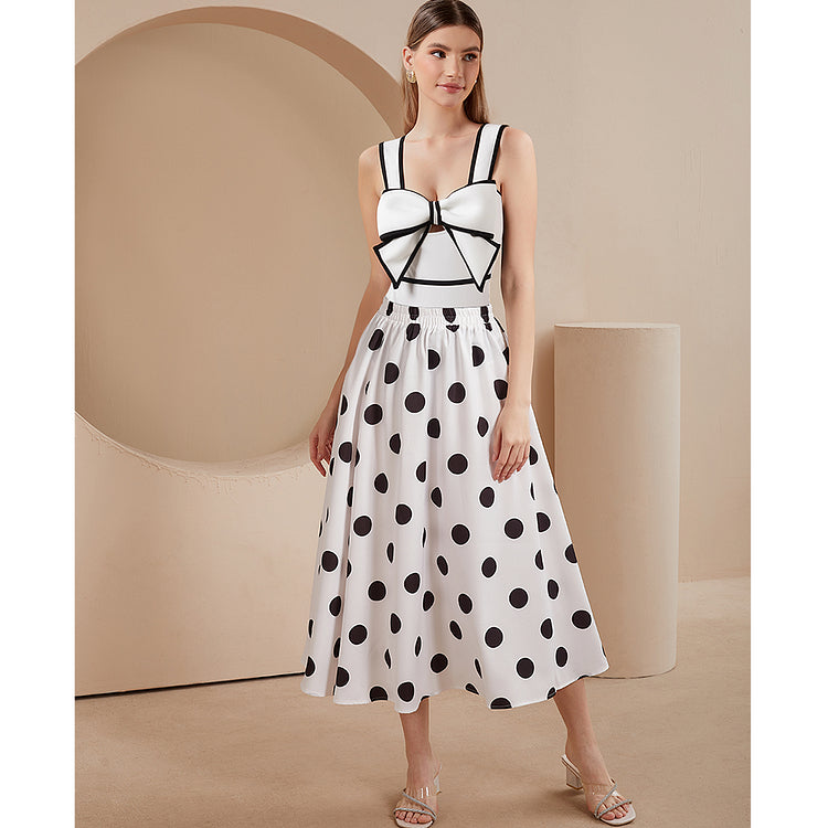 Maillot de bain une pièce et jupe à décor de nœud papillon noir et blanc 