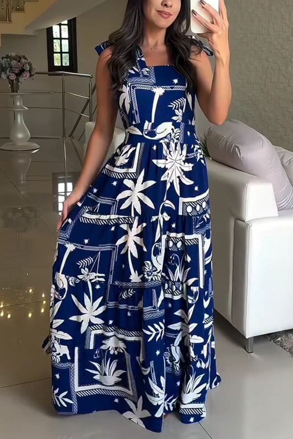 Robe longue plissée à bretelles et imprimé botanique pour les fêtes