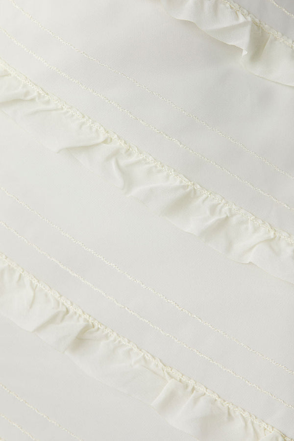 ROBE LONGUE SANS BRETELLES À VOLANTS ET SURPIQÛRES BAYLIE
