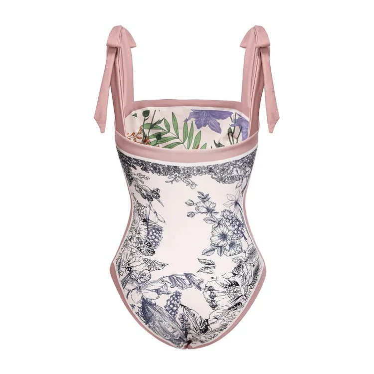 Maillot de bain une pièce réversible avec nœud papillon et jupe/sarong Swimgirls 