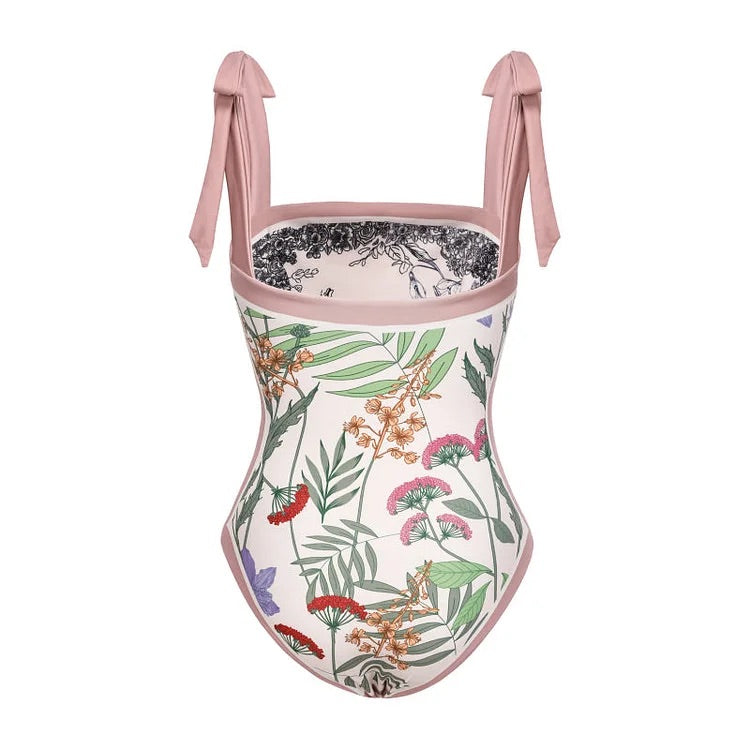 Maillot de bain une pièce réversible avec nœud papillon et jupe/sarong Swimgirls 