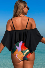 Two-piece swimsuit with large ruffled sleeves and floral shorts