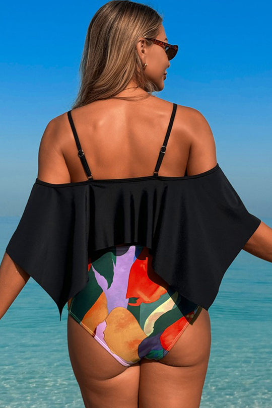 Two-piece swimsuit with large ruffled sleeves and floral shorts