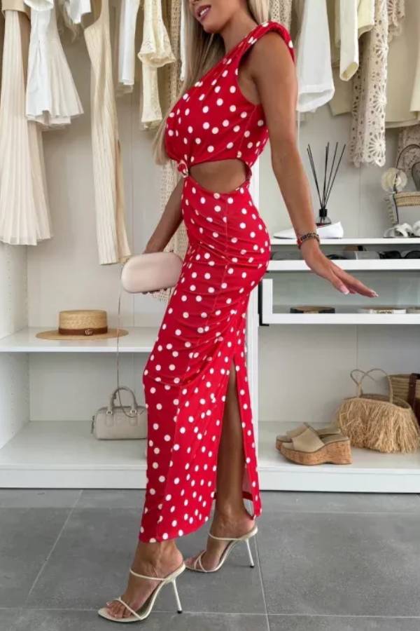 Roxane Stretch-Maxikleid mit gepunktetem Muster, Schulterpolstern, Metallausschnitten an der Taille und Schlitz