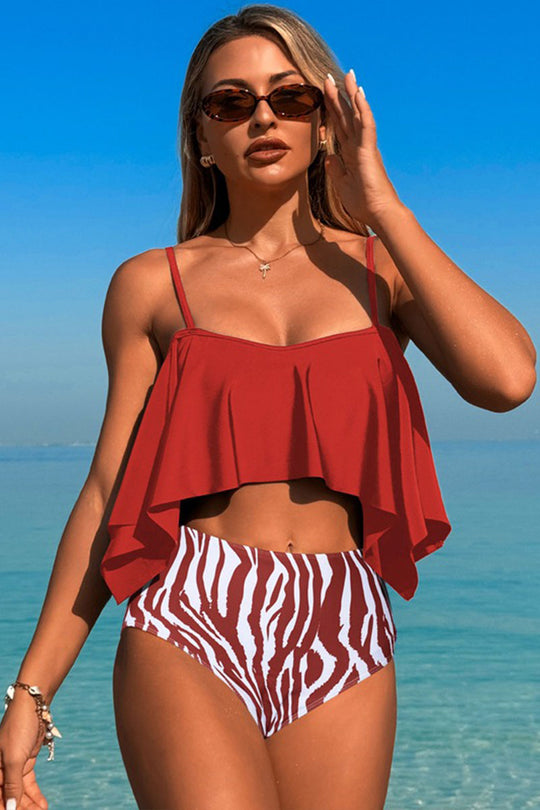 Two-piece swimsuit with large ruffled sleeves and floral shorts