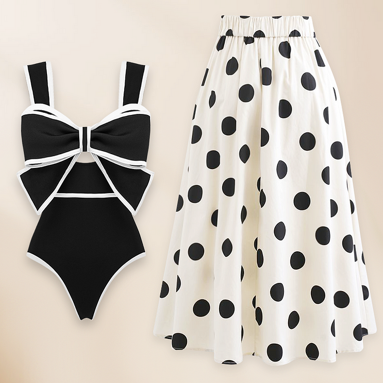 Maillot de bain une pièce et jupe à décor de nœud papillon noir et blanc 