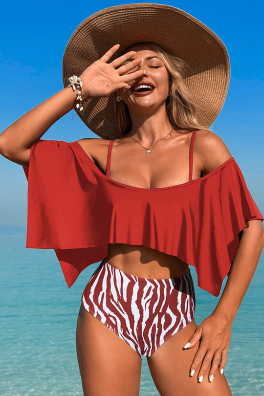 Two-piece swimsuit with large ruffled sleeves and floral shorts