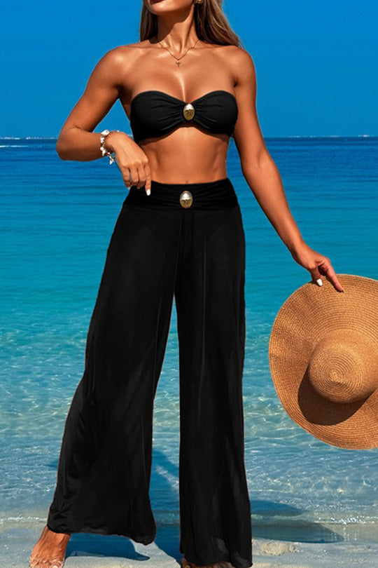 Three-piece swimsuit with button-like decorations on the chest