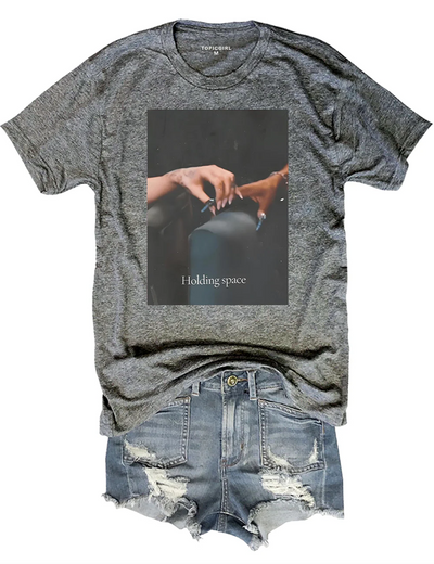 Holding Space Ariana Cynthia Finger Hold Defying Gravity Tee