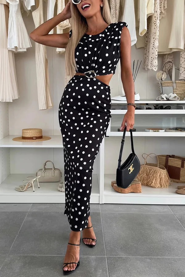 Roxane Stretch-Maxikleid mit gepunktetem Muster, Schulterpolstern, Metallausschnitten an der Taille und Schlitz