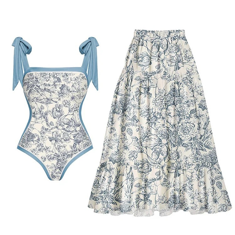 swimgirls Blauer, wendbarer Badeanzug mit Schleife und Schulterschnürung und Sarong/Rock 