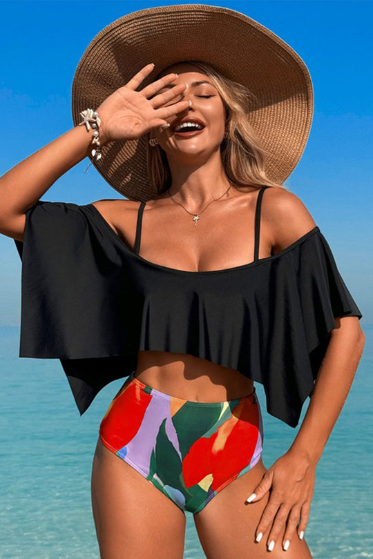 Two-piece swimsuit with large ruffled sleeves and floral shorts