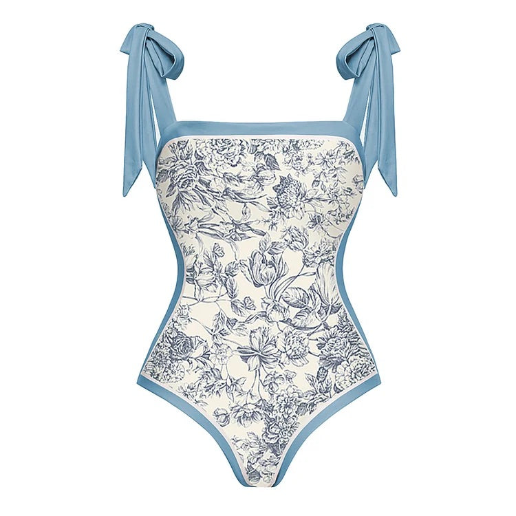 swimgirls Blauer, wendbarer Badeanzug mit Schleife und Schulterschnürung und Sarong/Rock 