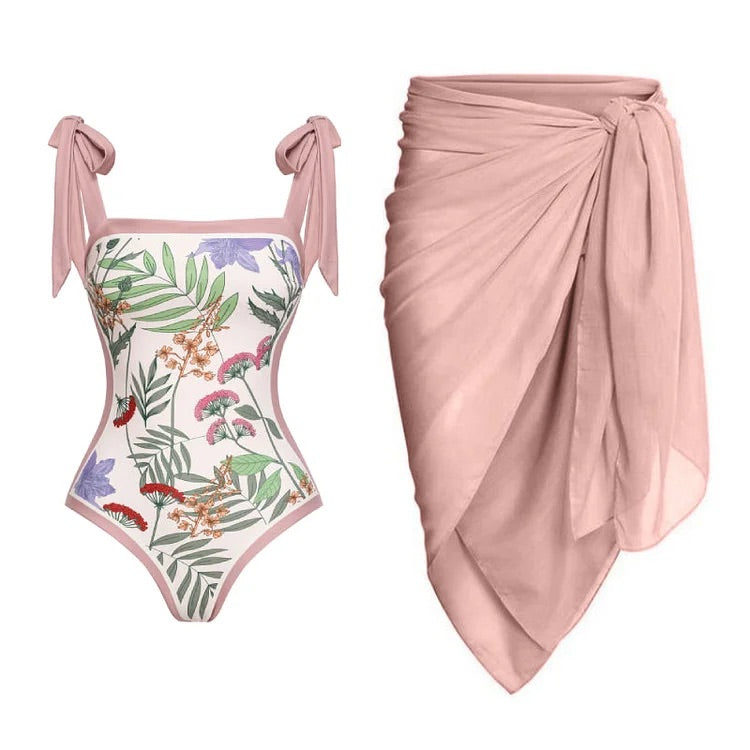 swimgirls Wende-Badeanzüge mit Schleife und Schulterschnürung, einteilig, und Rock/Sarong 