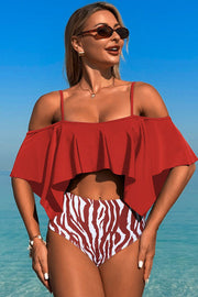 Two-piece swimsuit with large ruffled sleeves and floral shorts