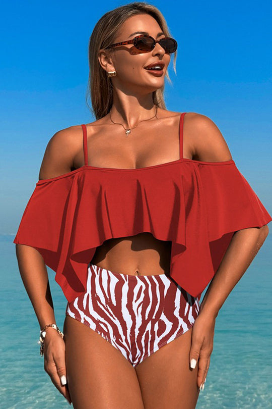 Two-piece swimsuit with large ruffled sleeves and floral shorts