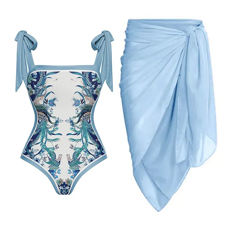 swimgirls Blauer, wendbarer Badeanzug mit Schleife und Schulterschnürung und Sarong/Rock 