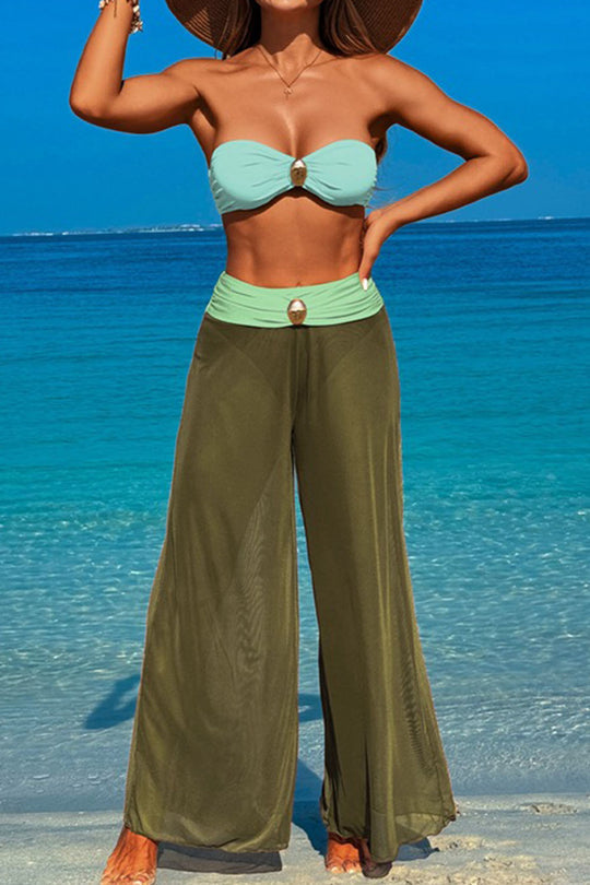 Three-piece swimsuit with button-like decorations on the chest
