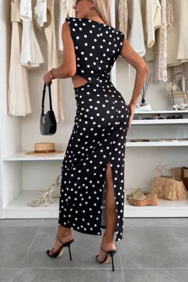 Roxane Stretch-Maxikleid mit gepunktetem Muster, Schulterpolstern, Metallausschnitten an der Taille und Schlitz
